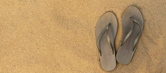 横幅光凉鞋翻转失败海滩金沙子的地方文本前视图