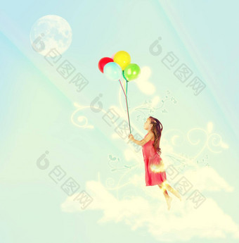 浮动年轻的女孩解除空气群色彩斑斓的气球