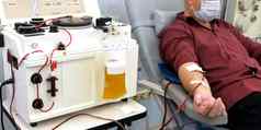 志愿者遭受了疾病冠状病毒科维德捐赠血