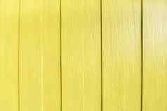 光黄色的墙木纹理设计师背景