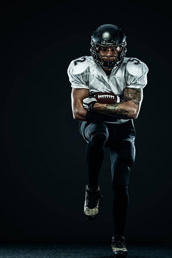 美国足球运动员球员头盔孤立的运行行动黑色的背景体育运动动机壁<strong>纸团</strong>队体育