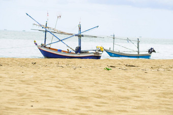 钓鱼船美丽的海滩海边景观泰国假期夏天概念的想法