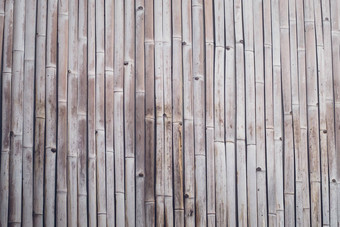 棕色（的）语气竹子板材栅栏纹理背景关闭装饰竹子木栅栏墙背景