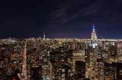 晚上城市景观成千上万的人点燃窗户晚上高上升建筑大都市曼哈顿纽约城市美国