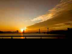 城市景观澳门著名的旅行塔橙色日落天空河澳门亚洲