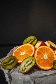 豪华的水果背景橙色猕猴桃减少工作室摄影水果孤立的黑色的背景复制空间高决议产品