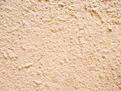 摘要粉红色的背景纹理混凝土墙粉红色的纹理表面墙覆盖装饰石膏木蛀虫类型特写镜头体系结构摘要背景
