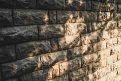 背景石头墙补丁阳光光影子太阳能野兔石头墙太阳