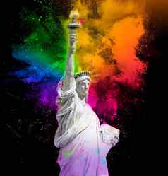 雕像自由色彩斑斓的彩虹胡里节油漆粉爆炸孤立的黑色的背景