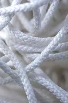厚纠结的白色绳子关闭特写镜头穿船绳子航海背景