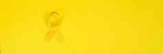 黄色的黄金丝带黄色的背景孩子们癌症概念意识月童年癌症一天2月网络横幅