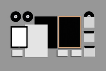 空白企业集灰色的背景由业务卡片文件夹平板电脑信封信纸的信头笔记本电脑闪光铅笔磁盘聪明的手机