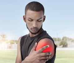 特写镜头运动员肩膀疼痛锻炼一边配置文件年轻的运动员站场持有僵硬的发炎联合肌肉应变突出显示红色的由于受伤