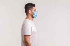 一边视图男人。穿面具防止感染呼吸疾病流感法律顾问