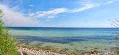 复制空间海多云的蓝色的天空背景地平线海洋波洗石头空海滩海岸和平风景优美的景观放松Zen夏天假期