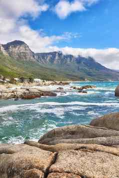 景观视图海洋海滩海云蓝色的天空复制空间营地湾角小镇南非洲潮汐波洗海岸线岩石巨石背景十二个使徒山
