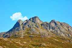 景观视图山蓝色的天空云复制空间挪威徒步旅行发现风景优美的农村粗糙的地形太阳闪亮的巨大的背景自然广阔的区域徒步旅行小道