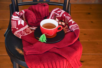 红色的杯茶包装温暖的圣诞节毛衣茶袋标签