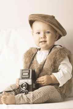 可爱的婴儿复古的相机