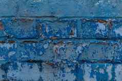 蓝色的破旧的破碎的砖墙背景纹理