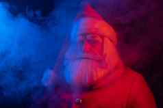 圣诞老人老人蓝色的红色的烟聚会，派对圣诞节