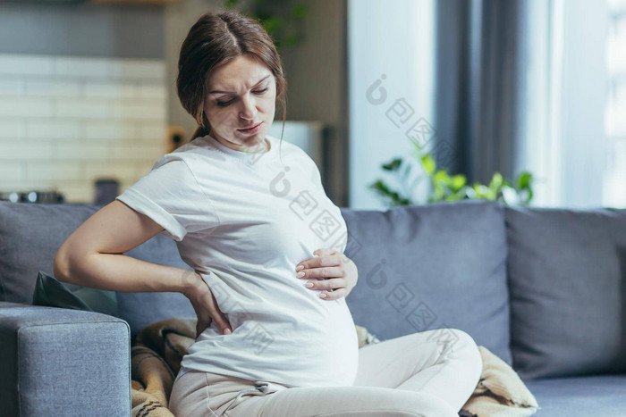 感觉不舒服怀孕了女人持有肚子感觉不舒服疼痛