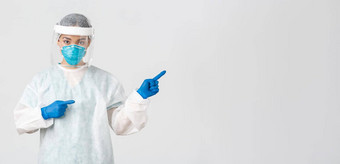 科维德冠状病毒疾病医疗保健工人概念专业女医生科技实验室员工个人保护设备指出手指显示白色背景