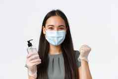小业务主人科维德防止病毒措施概念自信亚洲女人回来工作检疫穿医疗面具手套手洗手液