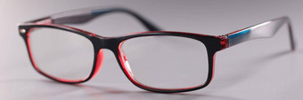 时尚塑料眼镜红黑灰色的背景