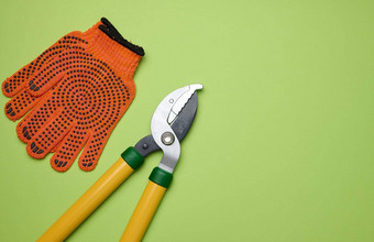 大花园修剪工具修剪分支机构树橙色纺织手套
