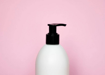 白色塑料肥皂自动售货机泵瓶孤立的粉红色的背景皮肤护理乳液洗澡至关重要的产品洗发水瓶浴身体乳液细液体手<strong>洗浴</strong>室配件