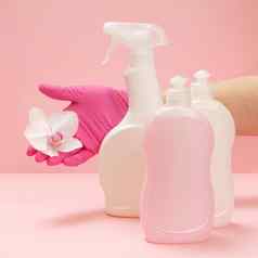 瓶洗液体手兰花花粉红色的背景