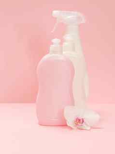 瓶洗液体兰花花粉红色的背景