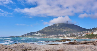 美丽的视图蓝色的海洋岩石海岸西方角南非洲多云的天空背景复制空间舒缓的宁静的水和谐自然新鲜的空气