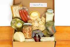 集杂货店食物有需要的危机意大利面豆子罐头食物纸板盒子准备好了捐赠前视图