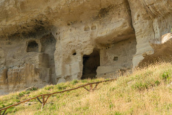 古老的楚富特城市洞穴Bakhchisaray路克里米亚中世纪的堡垒石头<strong>阳光</strong>明媚的天空视线俄罗斯楚富特墙巴赫奇萨赖<strong>小镇</strong>场景多石的