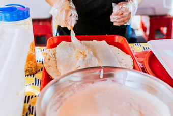 <strong>尼加拉瓜</strong>quesillo传统的中央美国食物quesillo手使<strong>尼加拉瓜</strong>quesillo关闭手使传统的quesillo腌洋葱