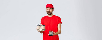 食物交付检疫保持首页订单在线概念厚颜无耻的快递红色的统一的帽t恤眨眼客户端将回来终端咖啡交付支付非接触式