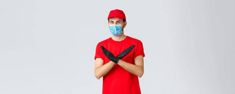 科维德self-quarantine在线购物航运概念快递不赞成联系航运货物拒绝拒绝工作脸面具手套使交叉标志