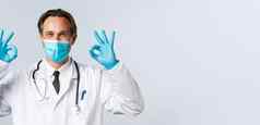 科维德病毒医疗保健疫苗接种概念医生保证保证质量服务诊所病人依赖医院工人医生面具手套显示标志
