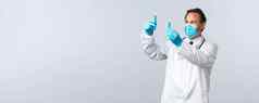 科维德防止病毒医疗保健工人疫苗接种概念专业诊所实验室医生医疗面具手套比较试管》疫苗白色背景