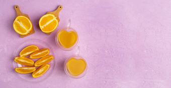 橙色汁橙色粉红色的背景准备橙色汁健康平躺复制空间