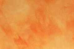 橙色摘要模式背景模式纹理石膏表面粉刷难看的东西黄金