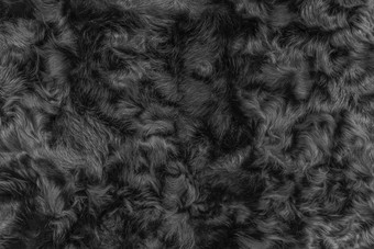 黑色的羊毛<strong>纹理皮毛</strong>背景黑暗软材料摘要表面模式自然