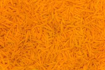 橙色背景有机成分新鲜的磨碎的胡萝卜