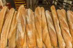 新鲜的烤货物面包店面包魔杖面包背景