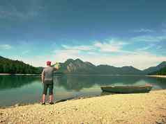 照片旅行者采取内存照片湖风景蓝色的湖