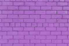 画砖墙粉红色的紫色的油漆纹理石头背景