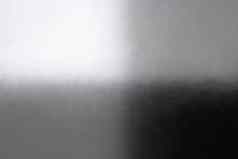黑色的灰色的白色几何模式光影子单色墙纹理背景