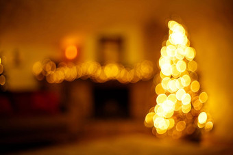 温暖的一年首页室内圣诞节树节日照明模糊假期背景